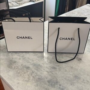 CHANEL White Bags with Black Rope Handles